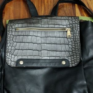 A Dark Grey Solid backpack